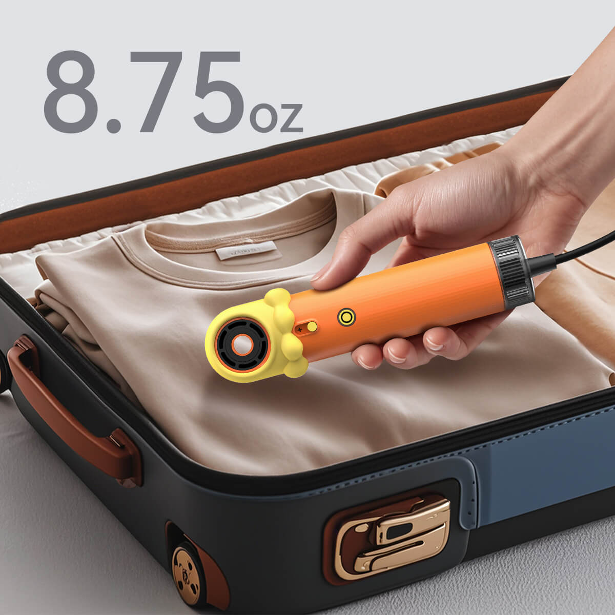 SYLPH 2 travel hair dryer in a suitcase flat lay, 8.75 oz lightweight body