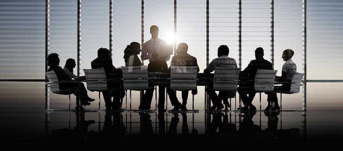 SYLPH brand image: silhouetted team in a meeting room